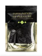 BIJOUX INDISCRETS szett Instruments Of Pleasure Green - szemmaszk, masszázsgyertya, masszázsgél, nyakkendő, kötöző, fekete színben